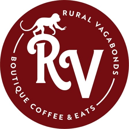 Rural Vagabonds Boutique Coffee and Eats logo, circular dark red badge with white monkey icon and RV text