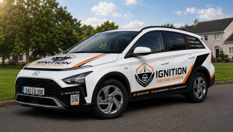 White Hyundai Nona electric SUV with IGNITION branding and orange accents parked in a residential driveway